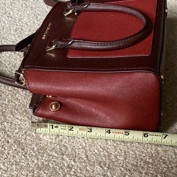 Michael Kors burgundy/brick colored handbag. - Picture 10 of 11